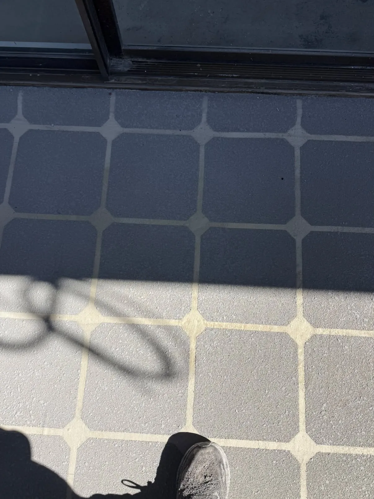 Close-up of a stencilled tile finish